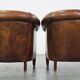 Set of 2 club armchairs in sheepskin leather with black piping