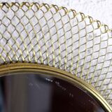 Vintage round mirror in gilded metal