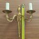 Pair of Louis XVI wall sconces in gilded bronze – Maison Lucien Gau