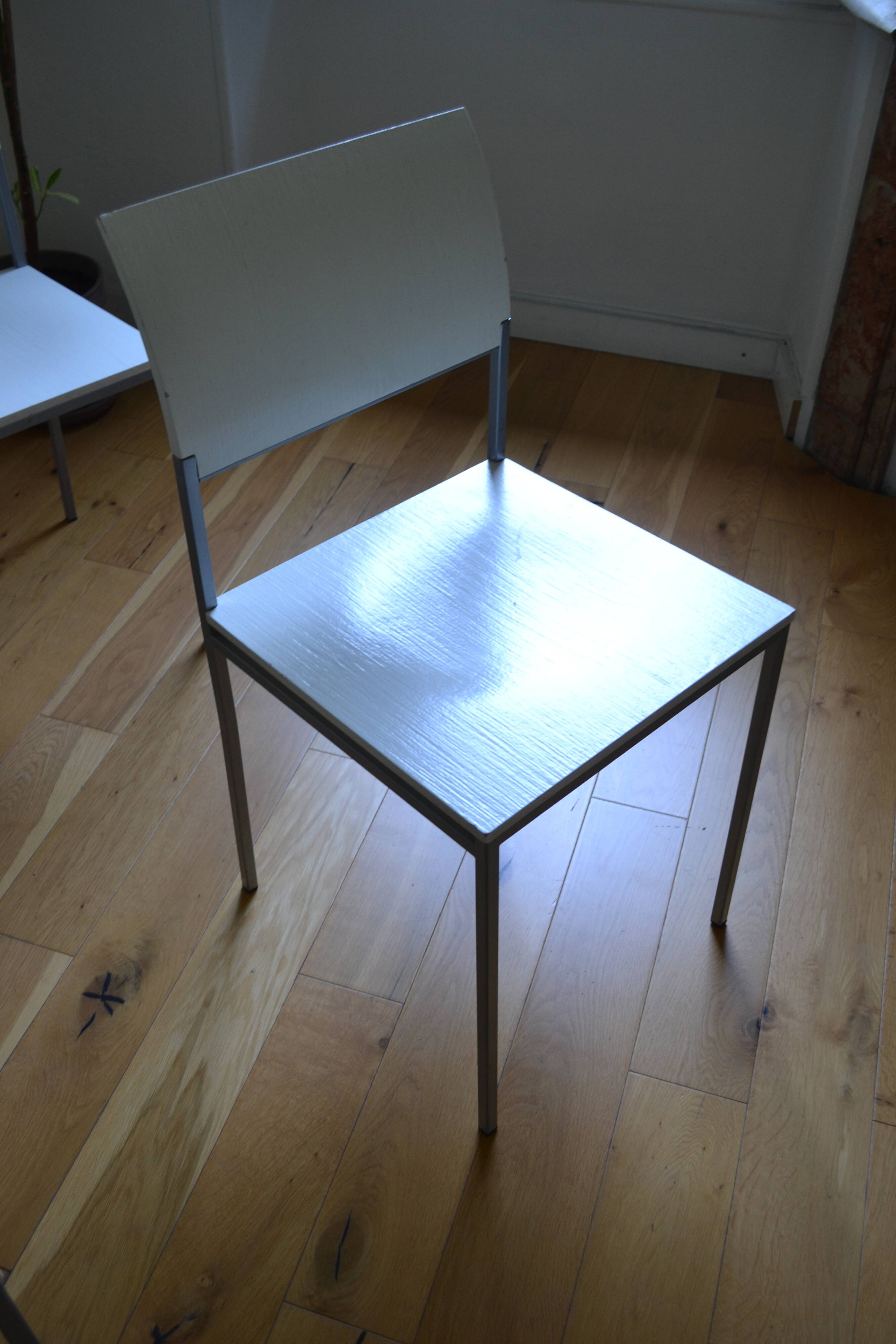 Set of 4 vintage metal and wood chairs from the 1990s.