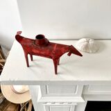 Zoomorphic candlestick made of red metal