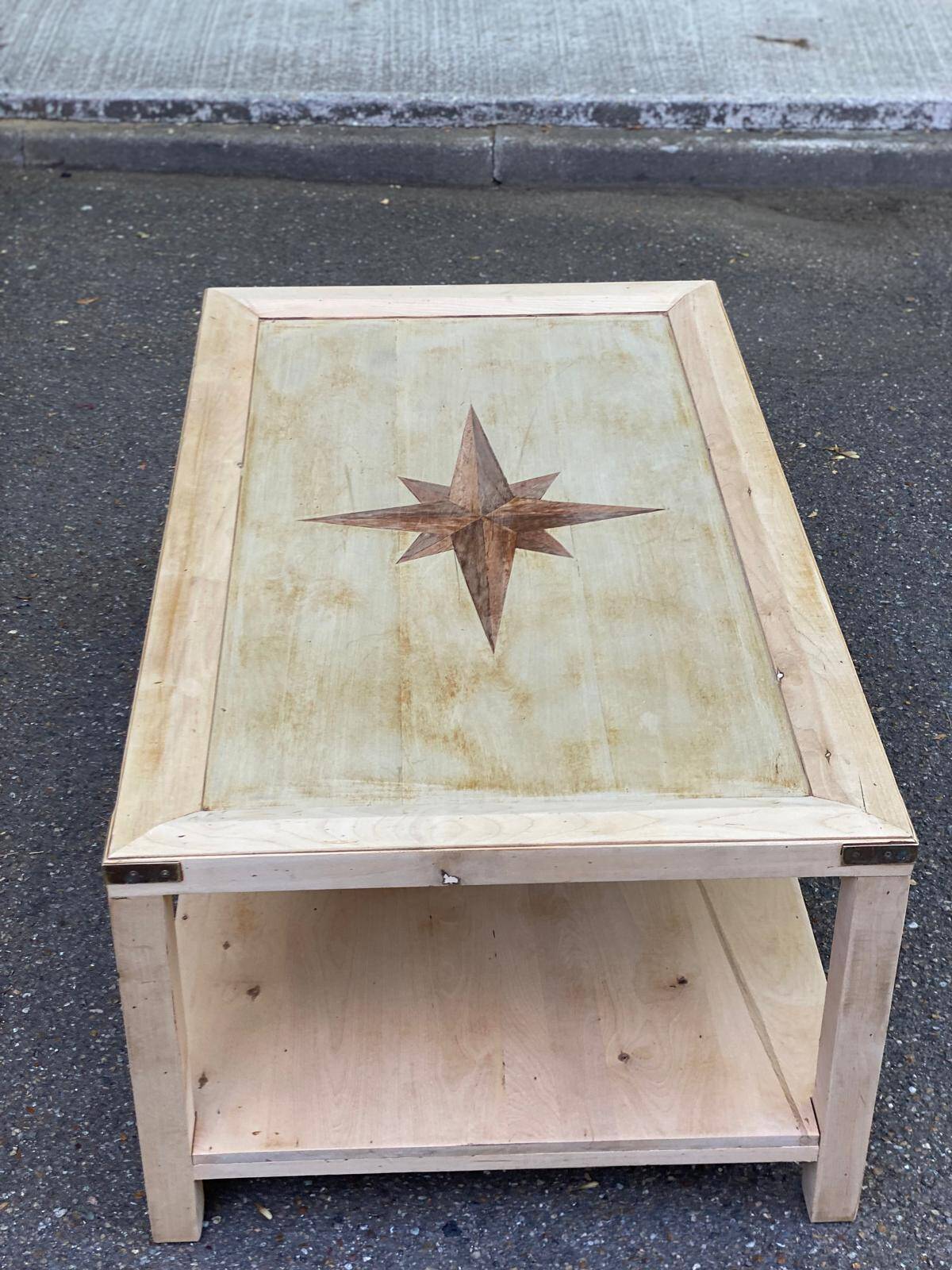Renovated solid wood coffee table in chic country seaside style.