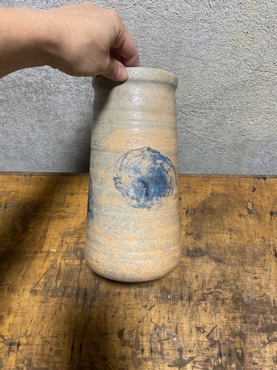 Ceramic vase with blue flowers