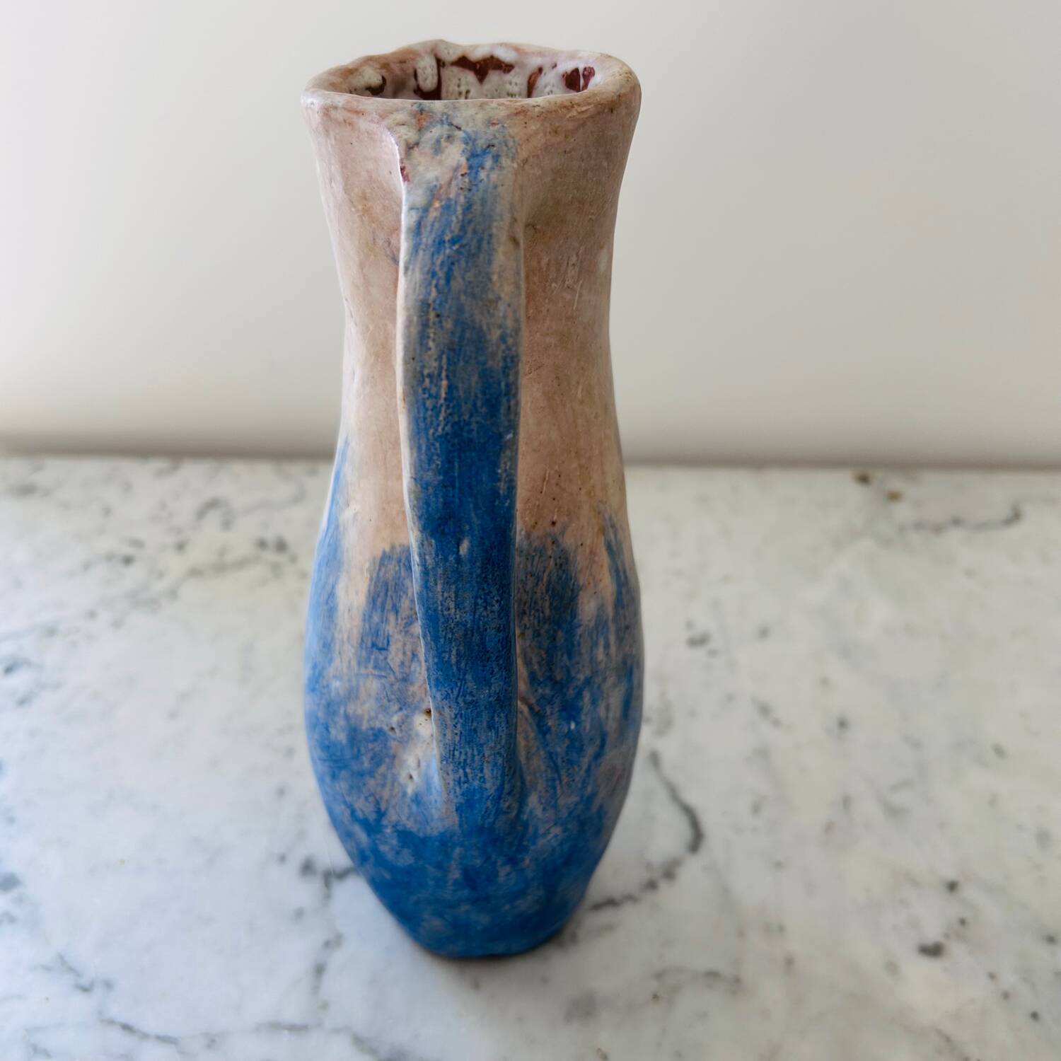 Set of artisanal pitcher and weathered cups