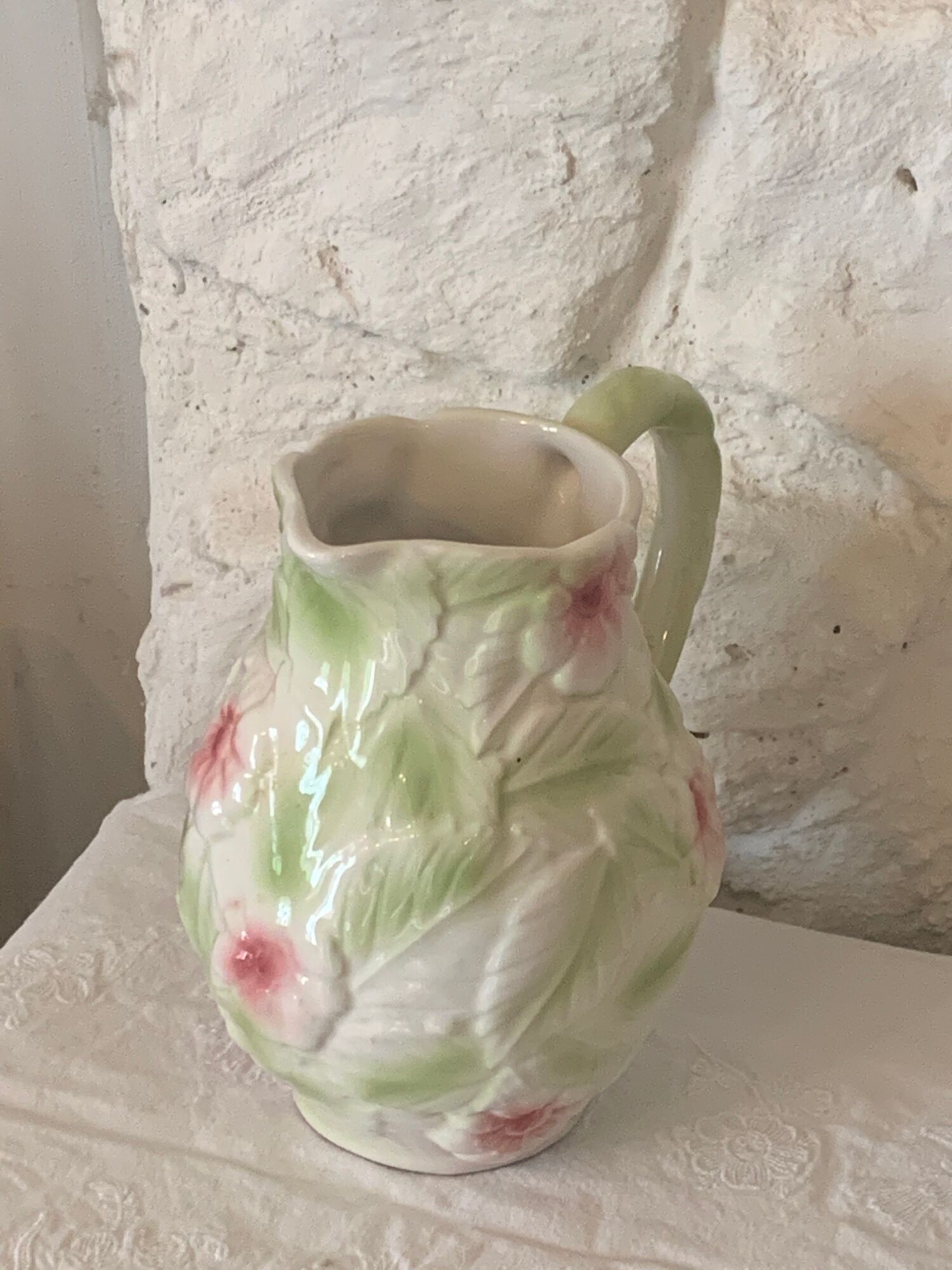 Ceramic dabbling jug enamelled floral motif