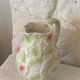 Ceramic dabbling jug enamelled floral motif