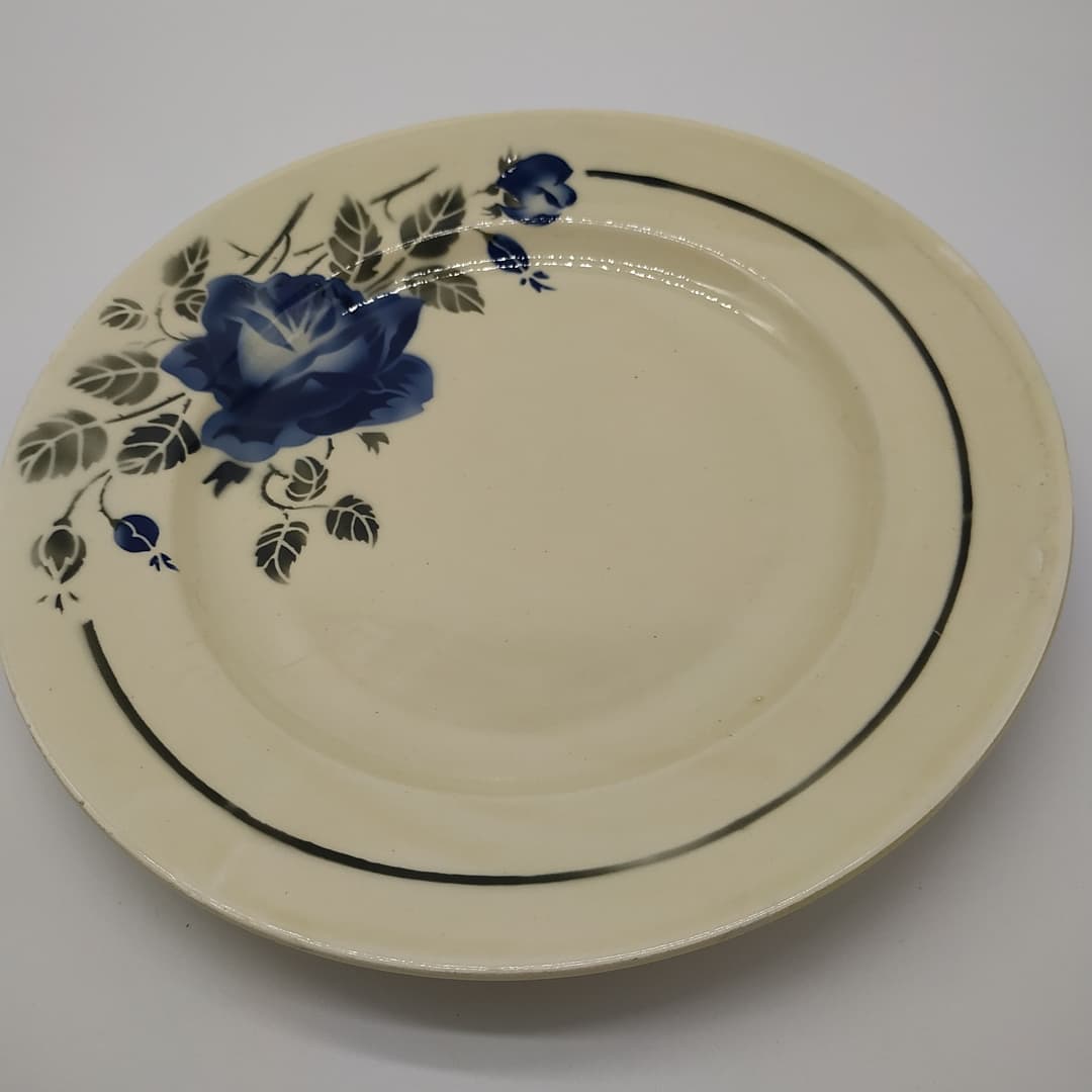 Dish with blue rose