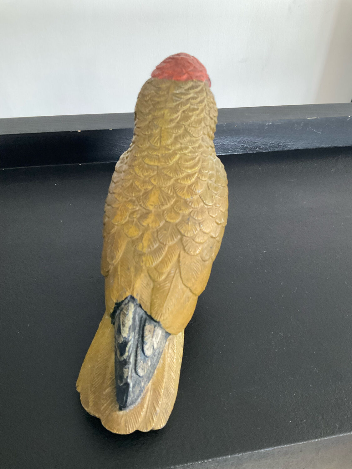 Vintage enamelled metal parakeet paperpress