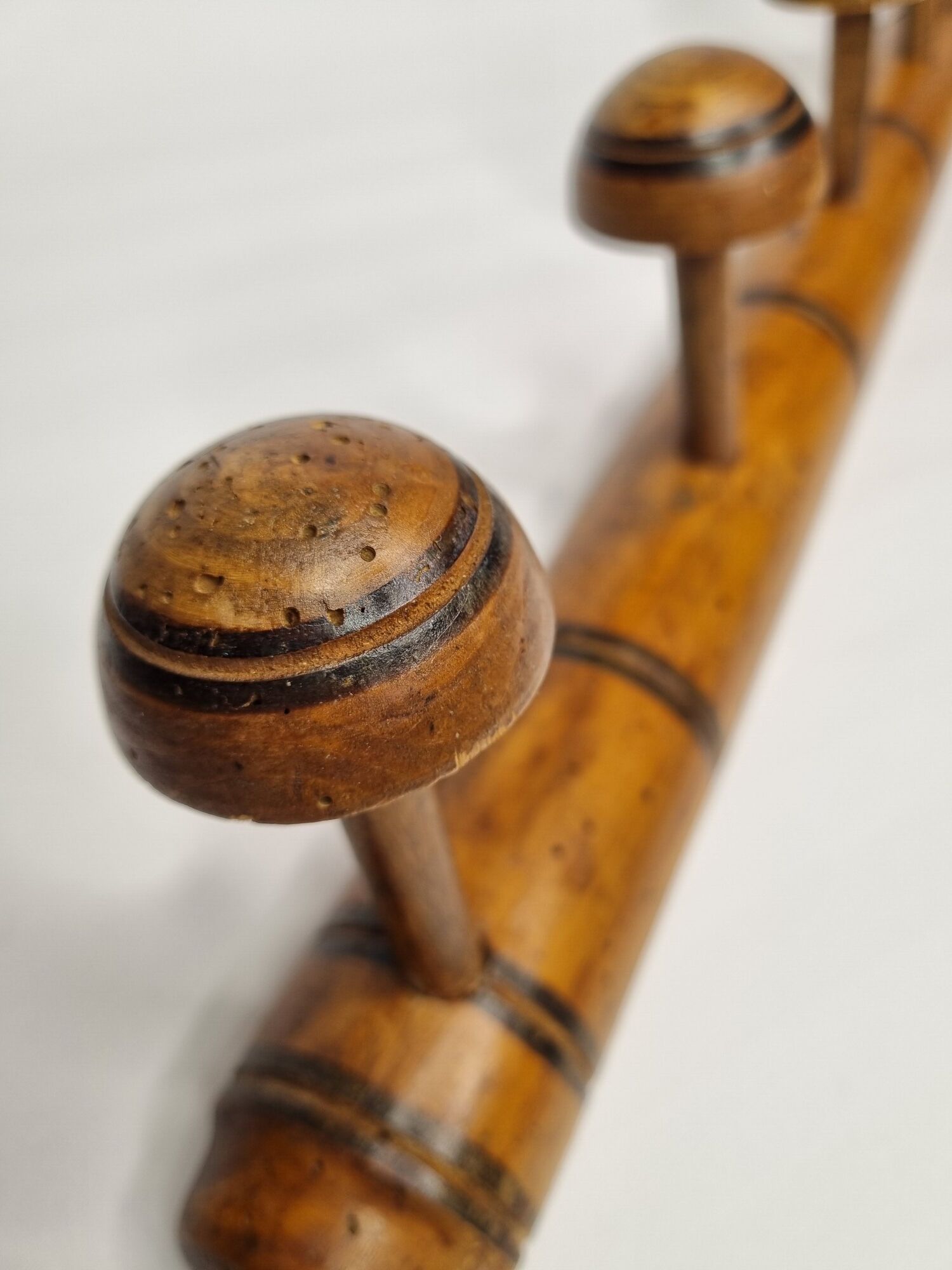 Old wooden coat rack turned in imitation of bamboo, 5 hooks, 63 cm
