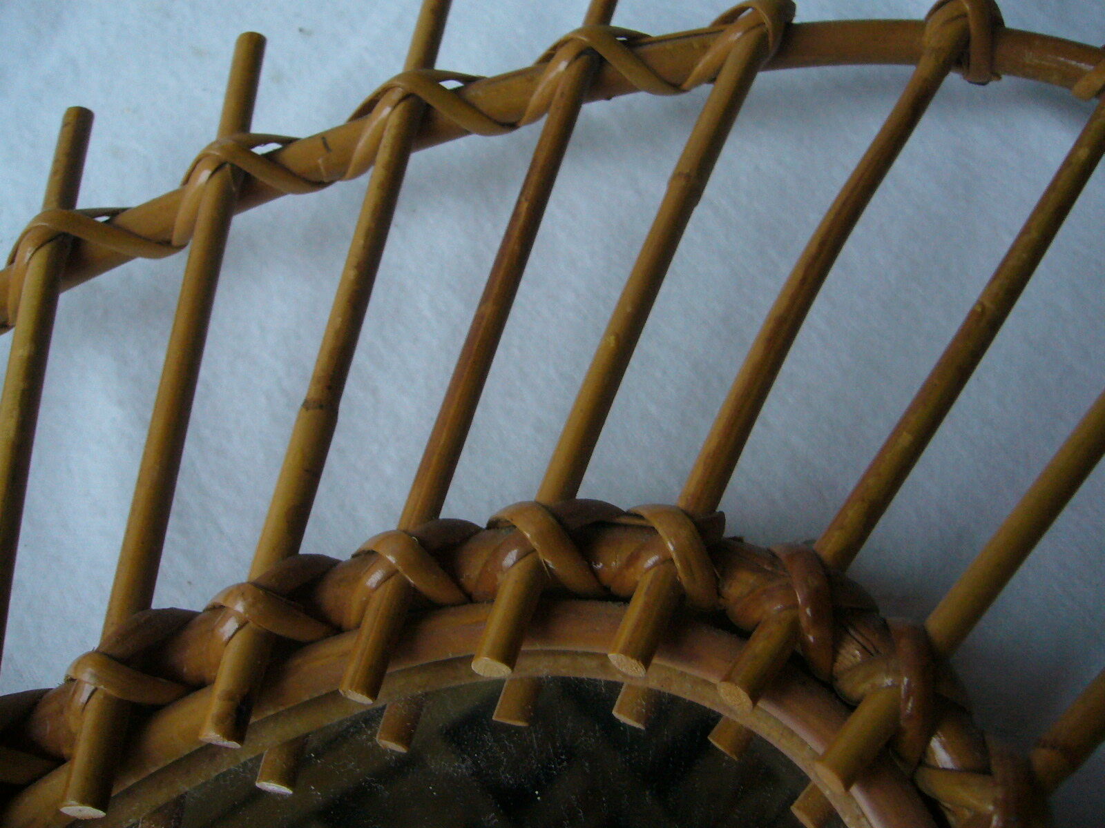 Vintage oval mirror in rattan