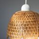 Vintage flower suspension in wicker rattan