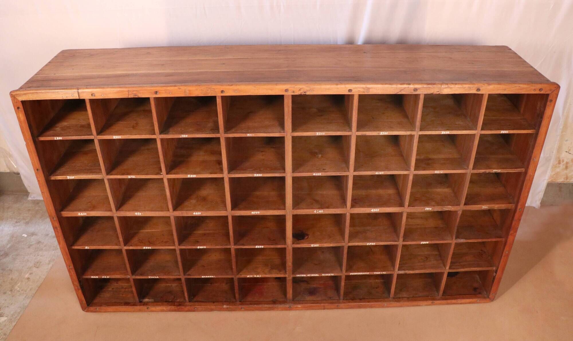 Old professional piece of furniture - postal sorting with 48 lockers in Burmese teak