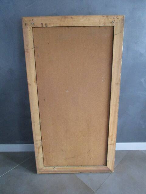 Large old mirror in wood and gilded stucco