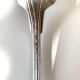 8 silver metal spoons