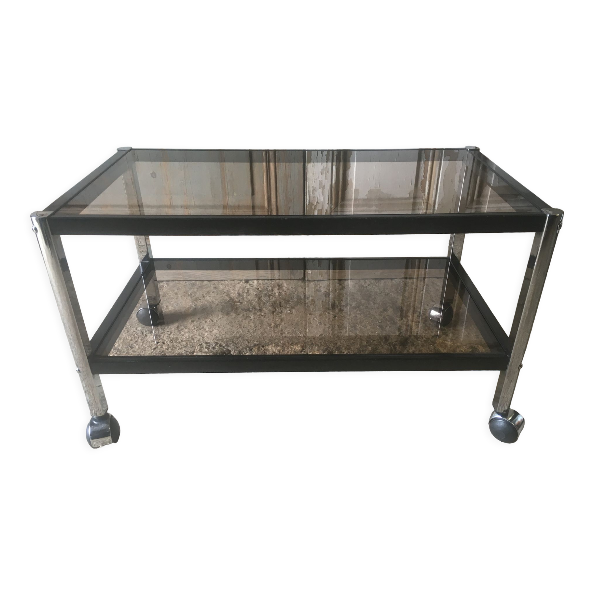 Metal coffee table with smoked glass.