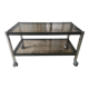 Metal coffee table with smoked glass.