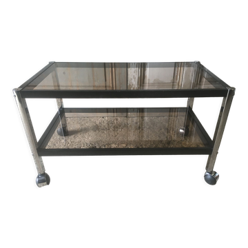 Coffee table in metal and smoked glass.