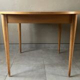 Vintage round table from the 60s with butterfly extension