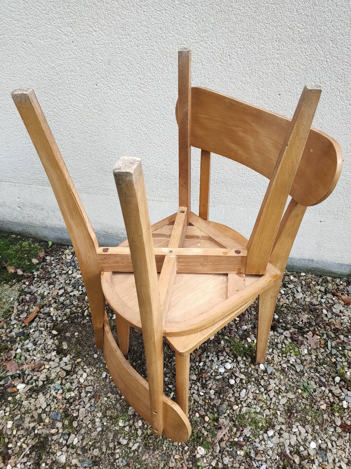 Pair of vintage solid wood bistro chairs
