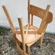 Pair of vintage solid wood bistro chairs