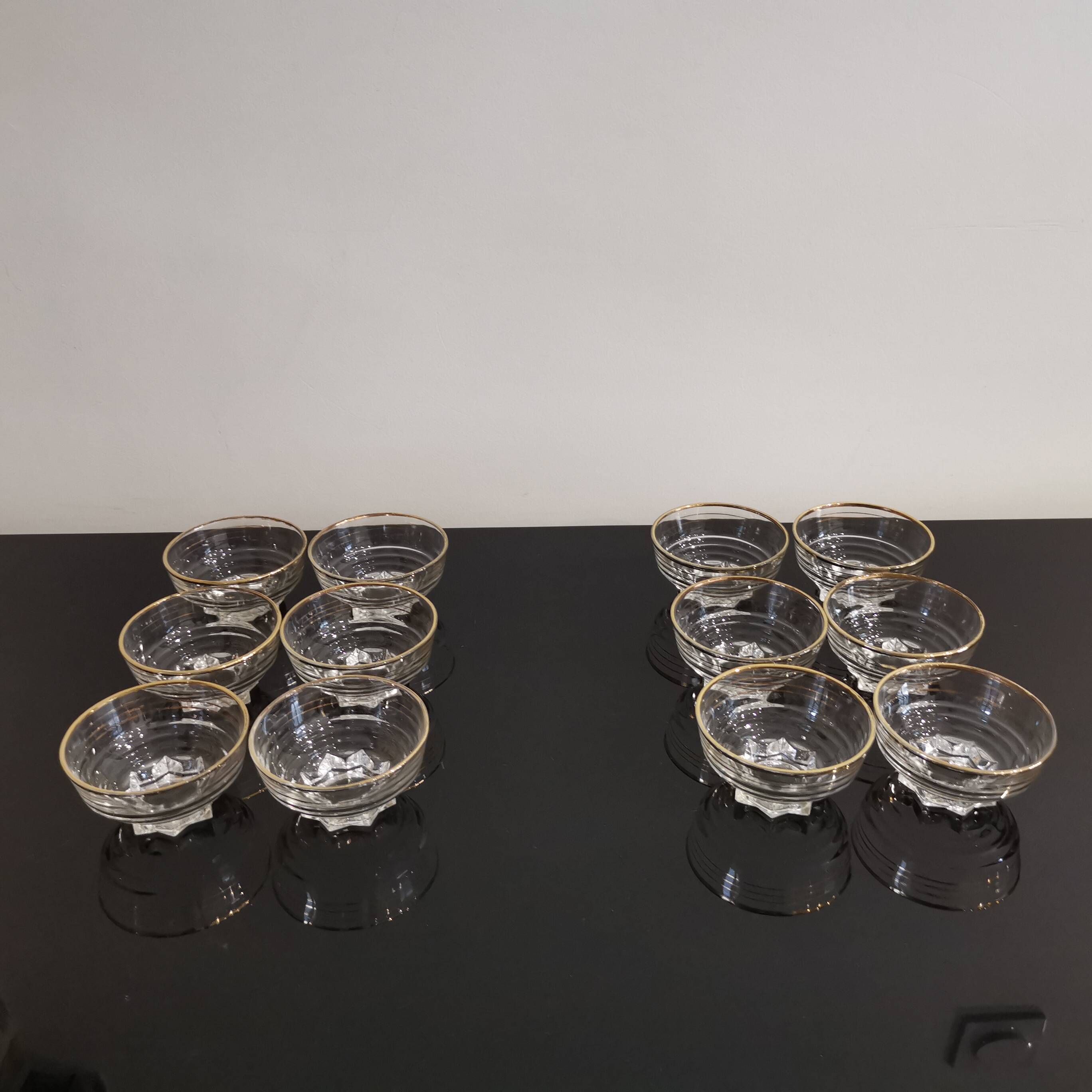 Set of 6 champagne glasses with gold edging and vintage star feet