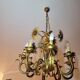 Set of painted metal chandeliers with flower decor
