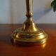 Old brass candle holder and its candle 21.5 cm