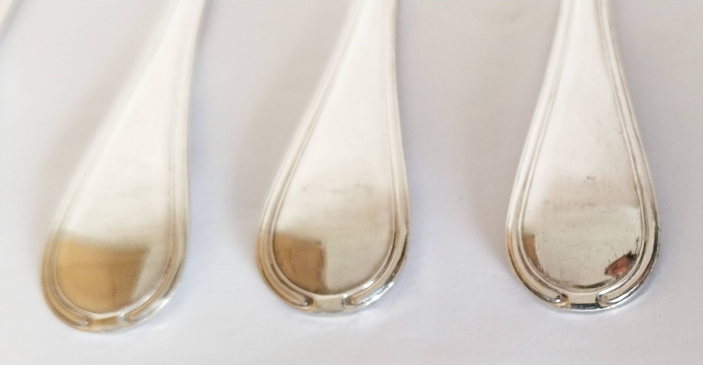 Dessert spoons, silver teaspoons