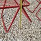Set of 5 vintage red metal mesh folding chairs, Ted Net style.