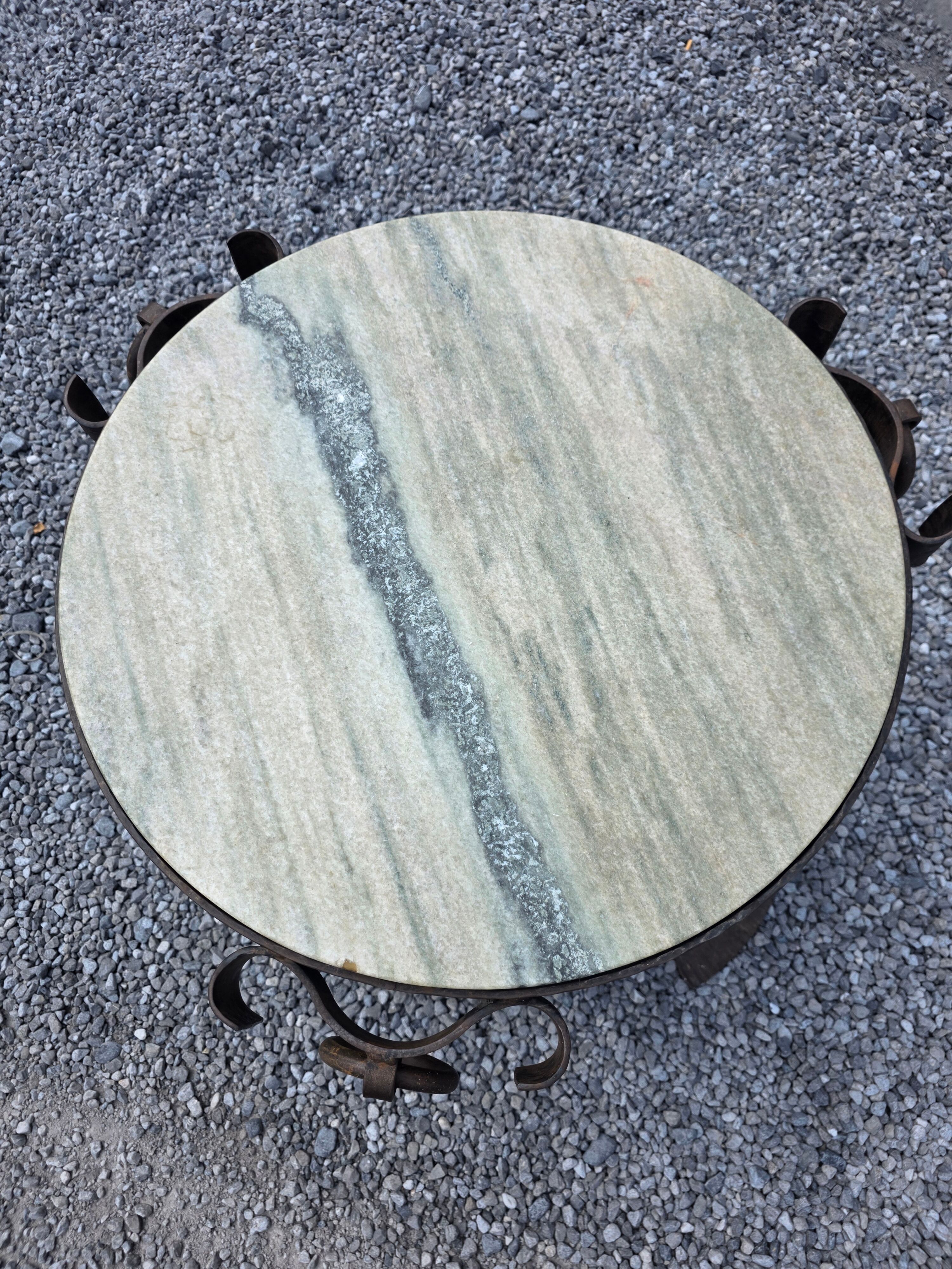 Wrought iron and marble coffee table, Jean Maurice Rothschild, circa 1950.