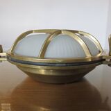 Brass porthole wall lamp