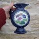 Blue ceramic vase with floral motifs