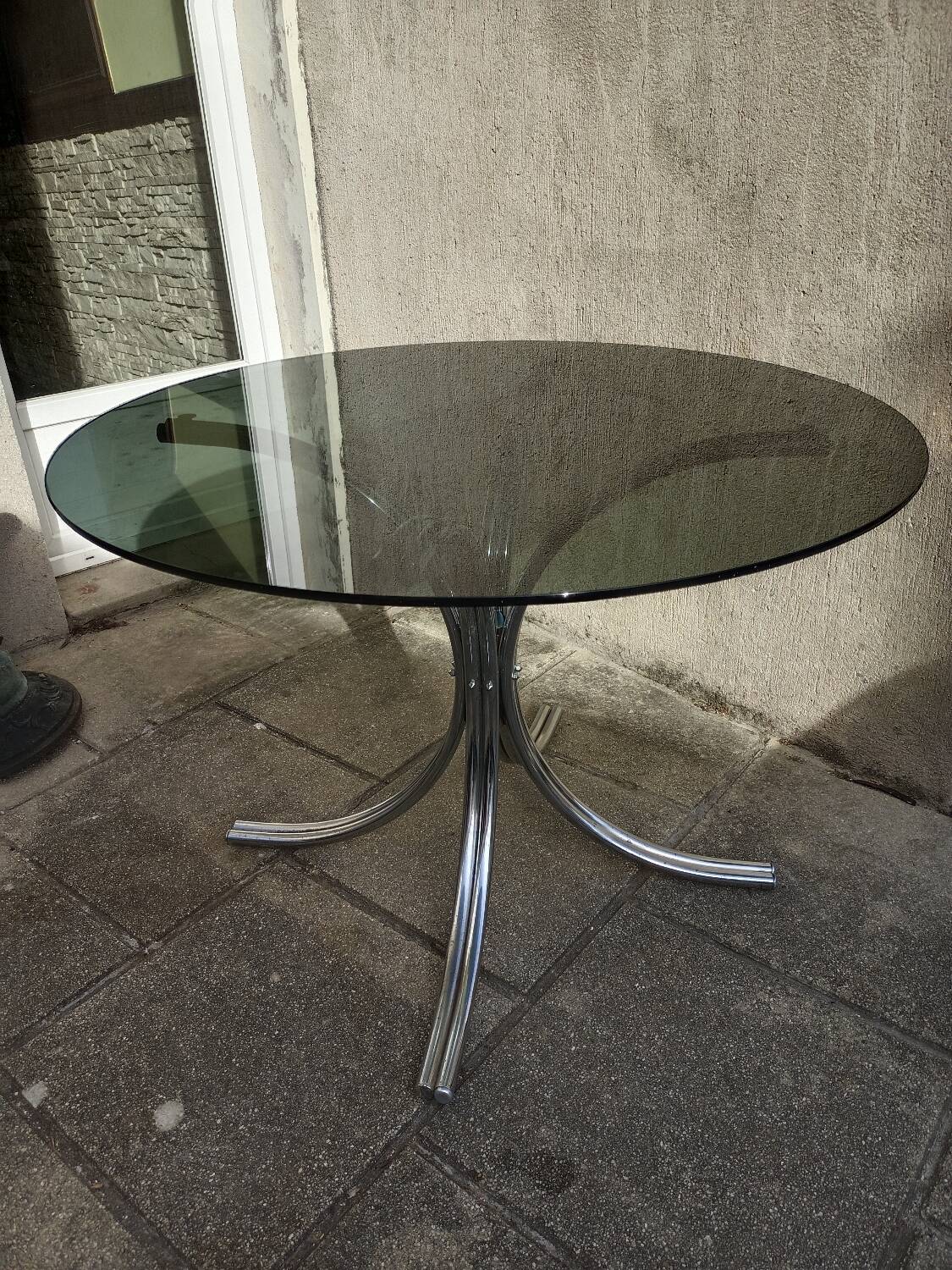 Chromed metal and smoked glass table