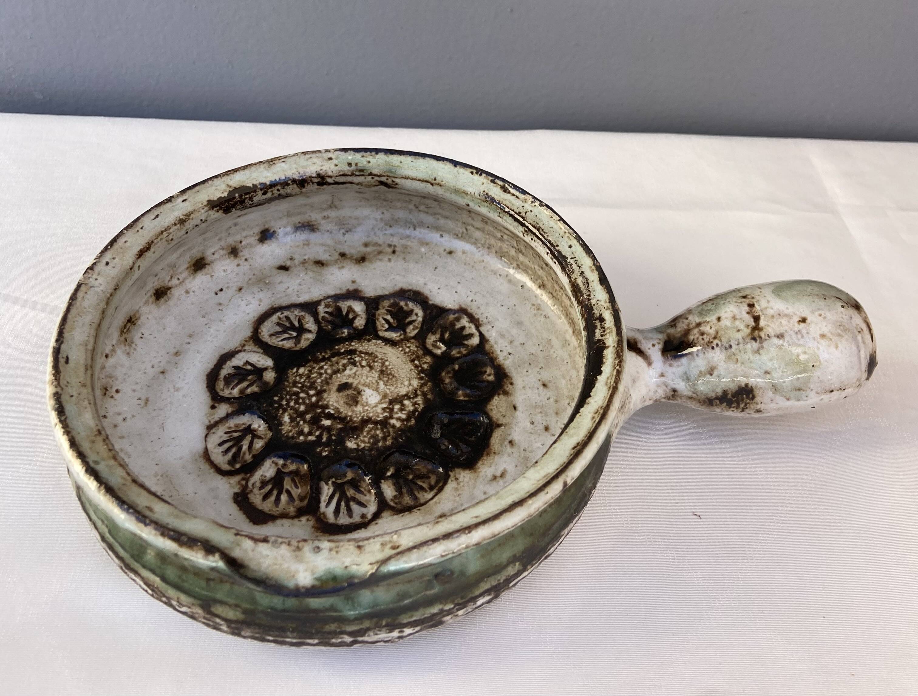 Two fondue pots by Albert Thiry