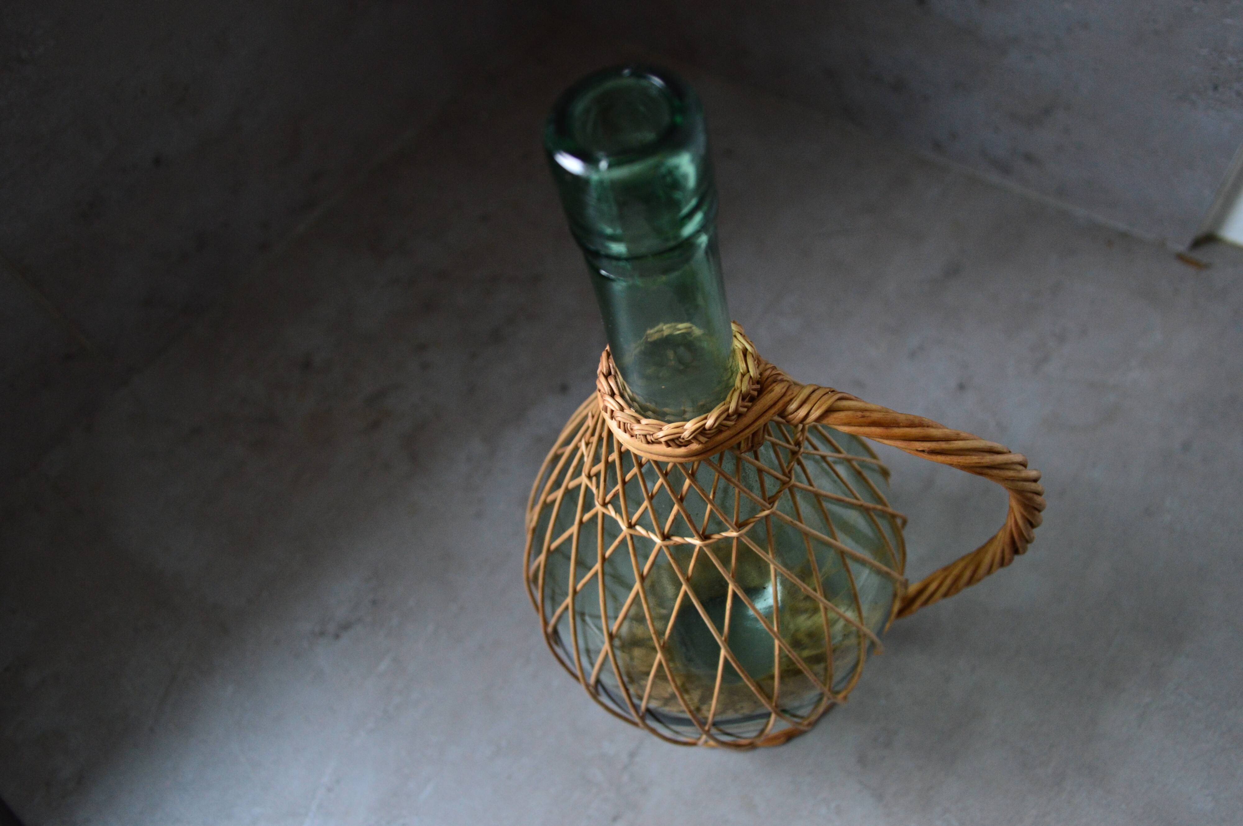 Vintage glass and rattan bottle