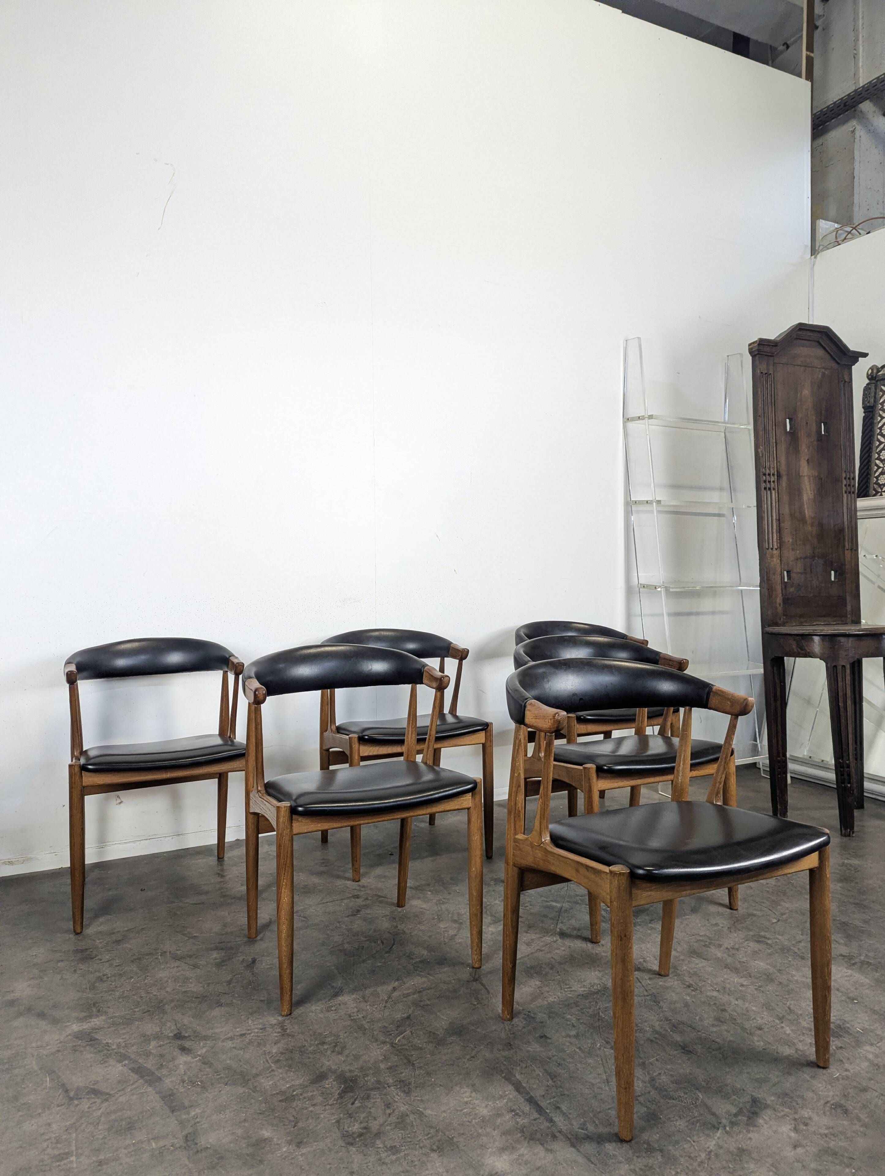 Set of 6 BA113 chairs by Johannes Andersen for Brdr. Andersens Møbelfabrik in teak and black skai.