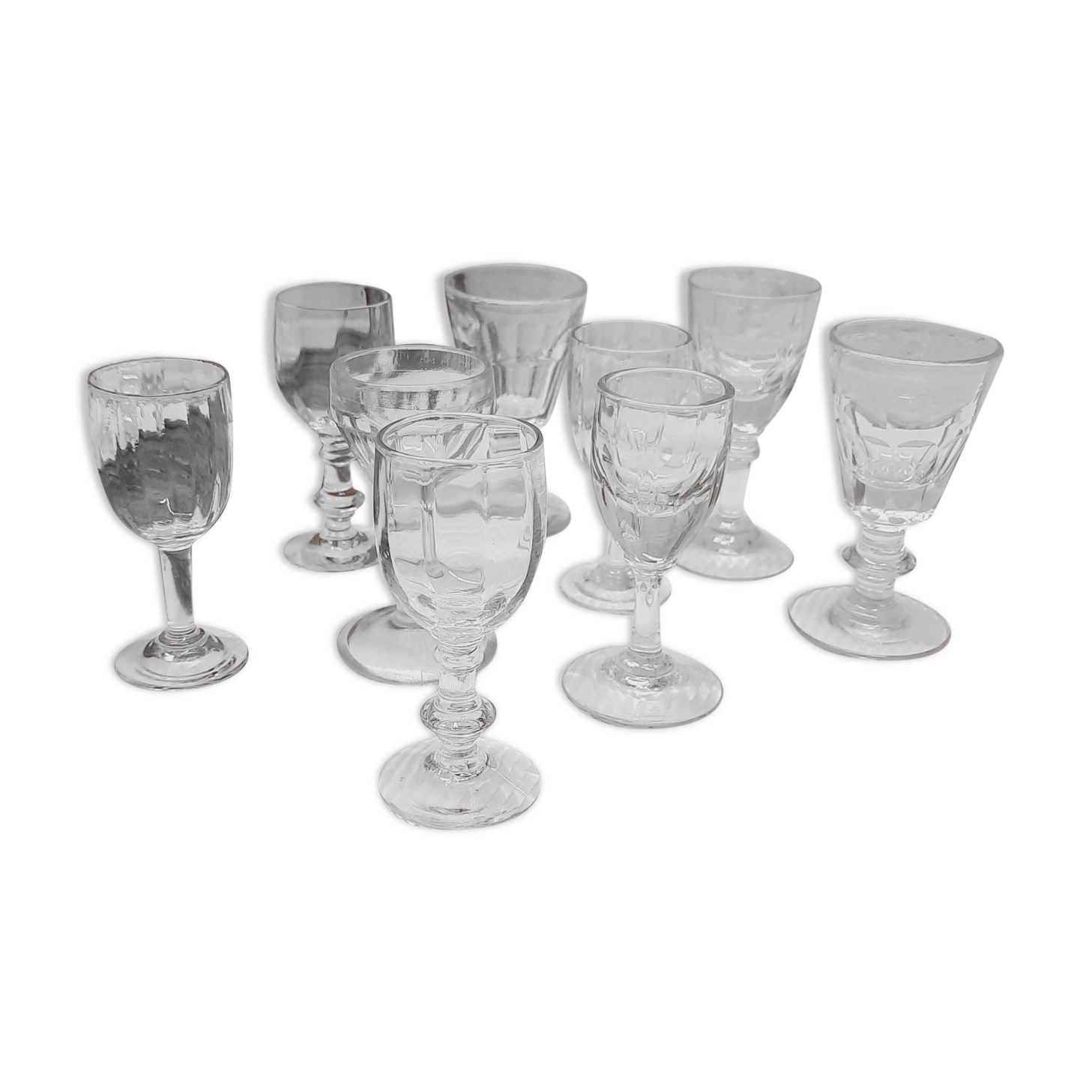 Lot 9 mismatched digestive glasses