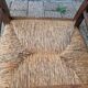 Antique solid wood stool with traditional rush seating – Late 19th century