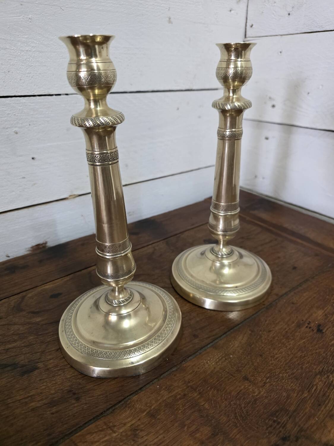 Antique pair of brass candlesticks