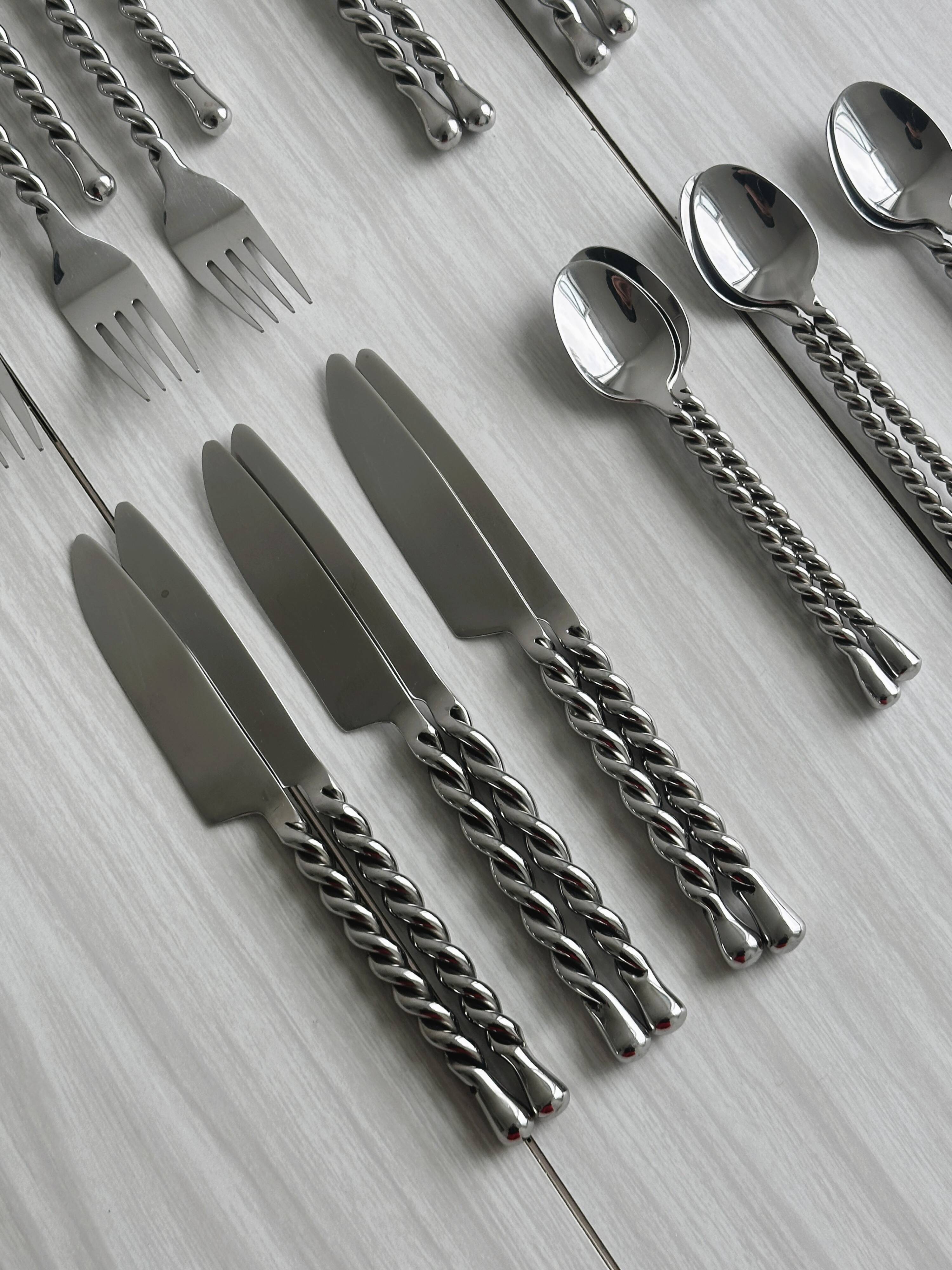 24 antique silver-plated twisted metal cutlery sets