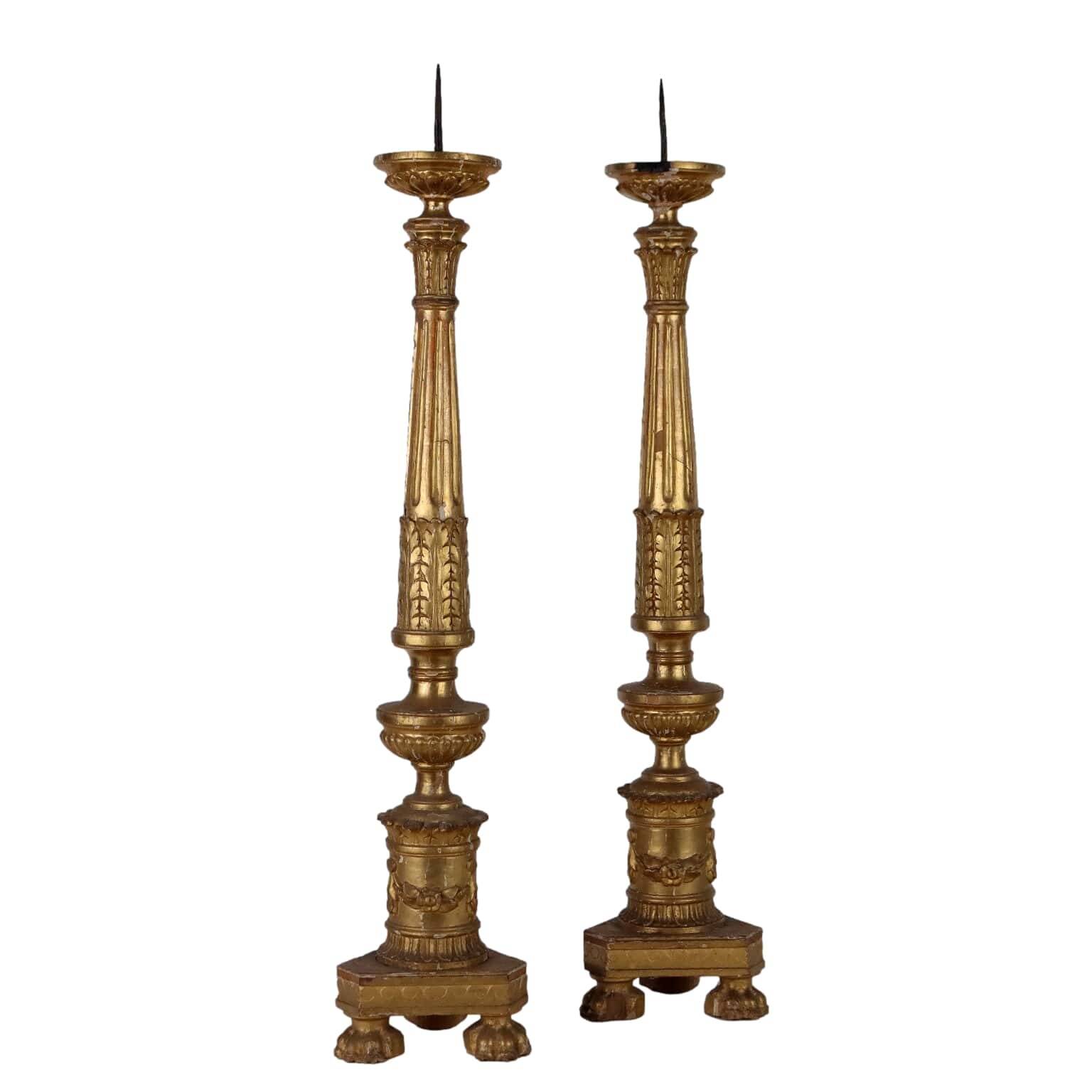 Pair of antique Empire candlesticks in wood, Europe, early 19th century.