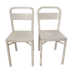 Pair of patinated white metal chairs
