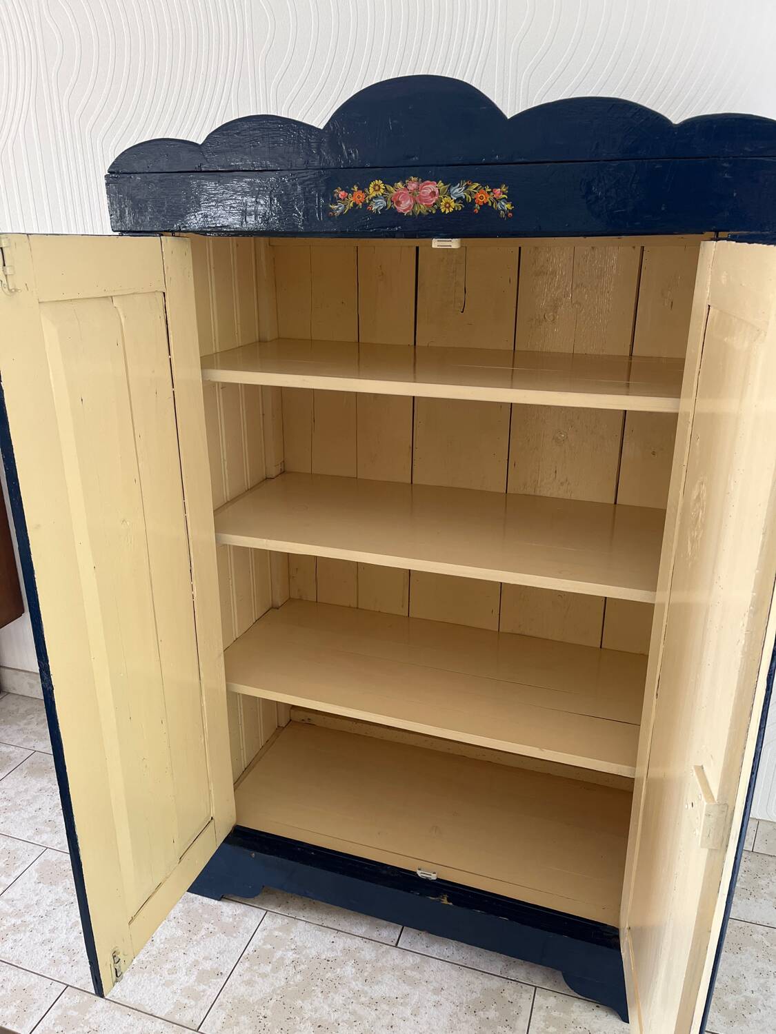 Old Parisian wardrobe painted in midnight blue