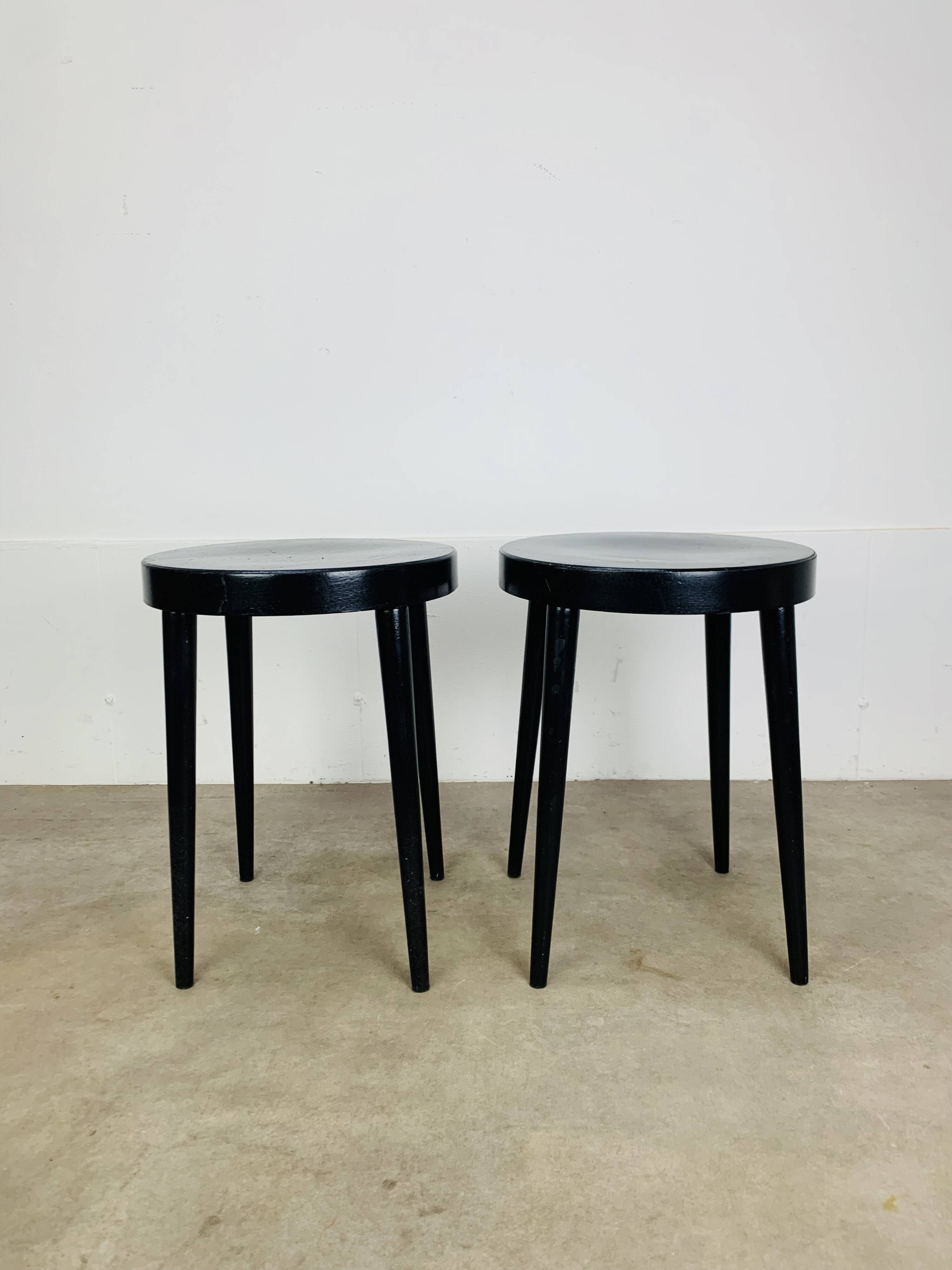 Pair of black Baumann stools, 1960s