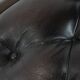 Chesterfield office chair in English style made of cow leather and wood.