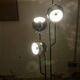 "Four heads" floor lamp by Goffredo Reggiani