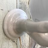 Hand-shaped ceramic wall light