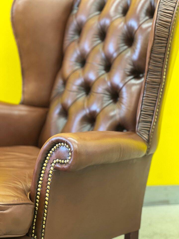Fauteuil Chesterfield traditionnel anglais en cuir
