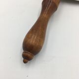 Ceramic aperitif dish and wooden handle.