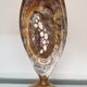 Vase en porcelaine doré mordoré